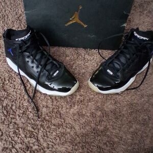 Jordan Black and White Sneakers with Blue Accent